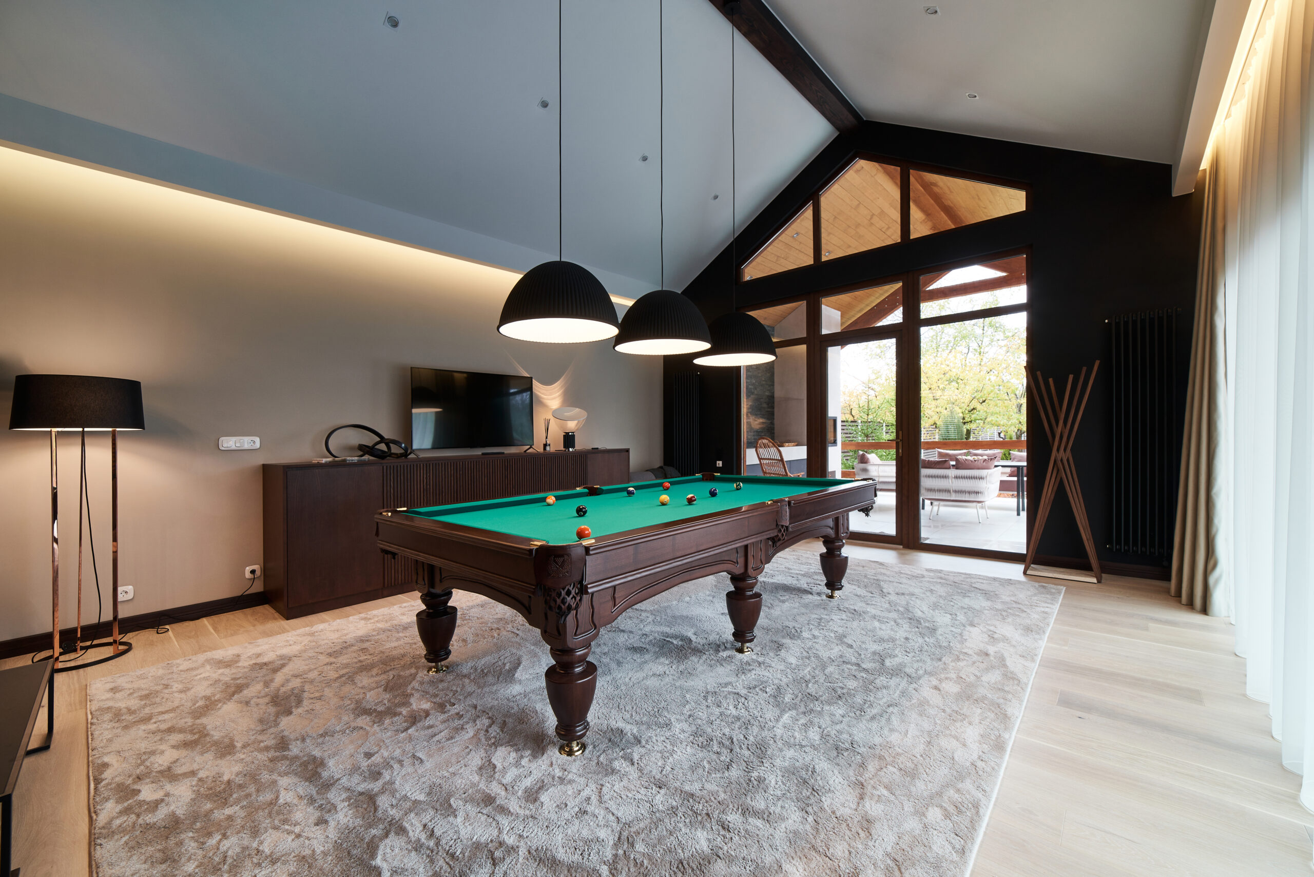 modern billiard room with a beautiful table and large windows, nobody